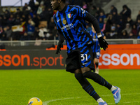 Yann Bisseck plays during the Coppa Italia match between FC Internazionale and Udinese Calcio in Milano, Italy, on December 19, 2024, at Giu...