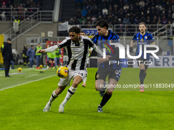 Arthur Atta and Alessandro Bastoni are in action during the Coppa Italia match between FC Internazionale and Udinese Calcio at Giuseppe Meaz...