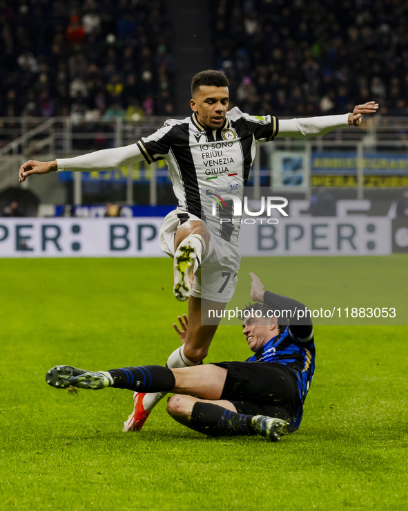 Rui Modesto and Alessandro Bastoni are in action during the Coppa Italia match between FC Internazionale and Udinese Calcio at Giuseppe Meaz...