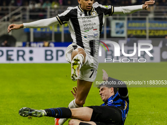 Rui Modesto and Alessandro Bastoni are in action during the Coppa Italia match between FC Internazionale and Udinese Calcio at Giuseppe Meaz...