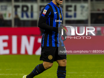 Lautaro Martinez plays during the Coppa Italia match between FC Internazionale and Udinese Calcio in Milano, Italy, on December 19, 2024, at...