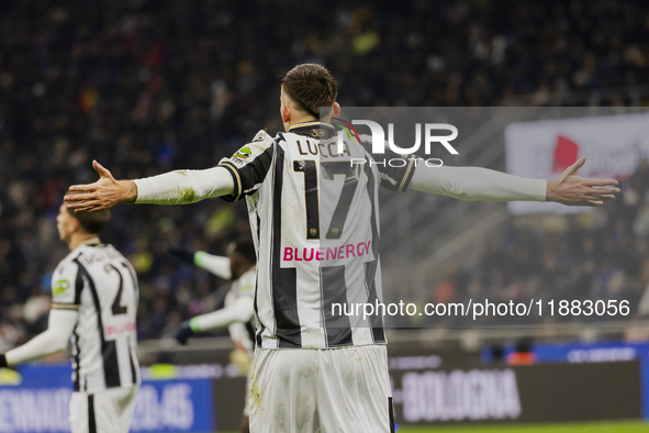 Lorenzo Lucca plays during the Coppa Italia match between FC Internazionale and Udinese Calcio in Milano, Italy, on December 19, 2024, at Gi...