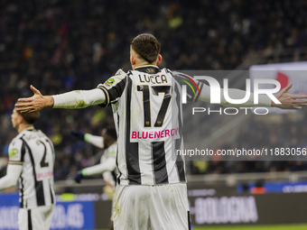 Lorenzo Lucca plays during the Coppa Italia match between FC Internazionale and Udinese Calcio in Milano, Italy, on December 19, 2024, at Gi...