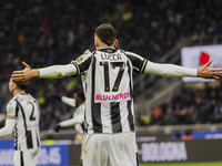 Lorenzo Lucca plays during the Coppa Italia match between FC Internazionale and Udinese Calcio in Milano, Italy, on December 19, 2024, at Gi...