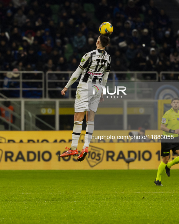 Lorenzo Lucca plays during the Coppa Italia match between FC Internazionale and Udinese Calcio in Milano, Italy, on December 19, 2024, at Gi...