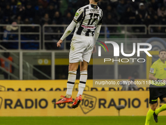 Lorenzo Lucca plays during the Coppa Italia match between FC Internazionale and Udinese Calcio in Milano, Italy, on December 19, 2024, at Gi...