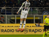 Lorenzo Lucca plays during the Coppa Italia match between FC Internazionale and Udinese Calcio in Milano, Italy, on December 19, 2024, at Gi...