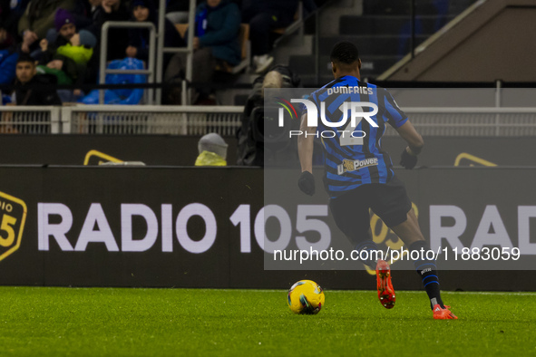 Denzel Dumfries plays during the Coppa Italia match between FC Internazionale and Udinese Calcio in Milano, Italy, on December 19, 2024, at...