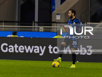 Hakan Calhanoglu plays during the Coppa Italia match between FC Internazionale and Udinese Calcio at Giuseppe Meazza Stadium in Milano, Ital...