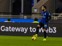 Hakan Calhanoglu plays during the Coppa Italia match between FC Internazionale and Udinese Calcio at Giuseppe Meazza Stadium in Milano, Ital...