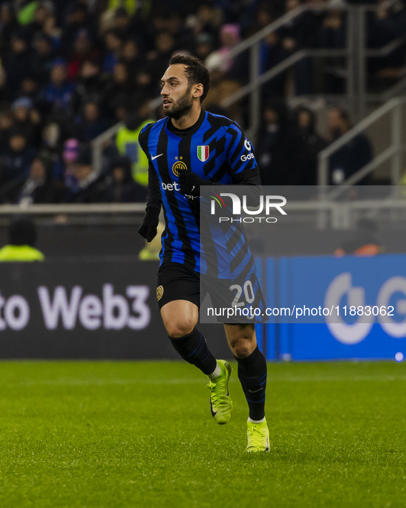 Hakan Calhanoglu plays during the Coppa Italia match between FC Internazionale and Udinese Calcio at Giuseppe Meazza Stadium in Milano, Ital...