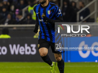 Hakan Calhanoglu plays during the Coppa Italia match between FC Internazionale and Udinese Calcio at Giuseppe Meazza Stadium in Milano, Ital...