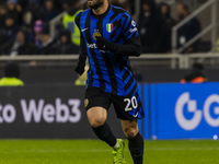 Hakan Calhanoglu plays during the Coppa Italia match between FC Internazionale and Udinese Calcio at Giuseppe Meazza Stadium in Milano, Ital...