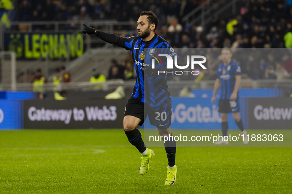 Hakan Calhanoglu plays during the Coppa Italia match between FC Internazionale and Udinese Calcio at Giuseppe Meazza Stadium in Milano, Ital...