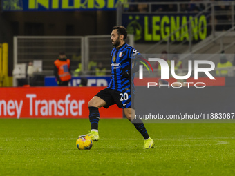 Hakan Calhanoglu plays during the Coppa Italia match between FC Internazionale and Udinese Calcio at Giuseppe Meazza Stadium in Milano, Ital...