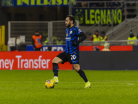 Hakan Calhanoglu plays during the Coppa Italia match between FC Internazionale and Udinese Calcio at Giuseppe Meazza Stadium in Milano, Ital...