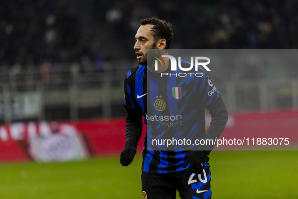 Hakan Calhanoglu plays during the Coppa Italia match between FC Internazionale and Udinese Calcio at Giuseppe Meazza Stadium in Milano, Ital...