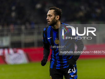 Hakan Calhanoglu plays during the Coppa Italia match between FC Internazionale and Udinese Calcio at Giuseppe Meazza Stadium in Milano, Ital...