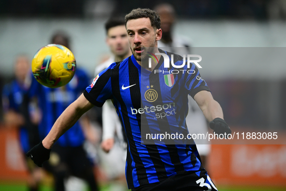 Carlos Augusto of Inter Milan is in action during the Coppa Italia Frecciarossa match between Inter Milan and Udinese Calcio at Giuseppe Mea...