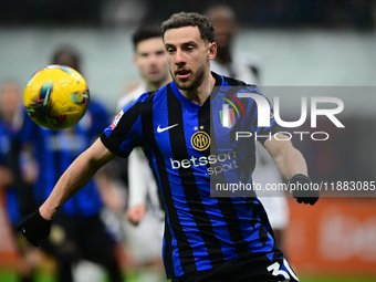 Carlos Augusto of Inter Milan is in action during the Coppa Italia Frecciarossa match between Inter Milan and Udinese Calcio at Giuseppe Mea...