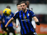 Carlos Augusto of Inter Milan is in action during the Coppa Italia Frecciarossa match between Inter Milan and Udinese Calcio at Giuseppe Mea...