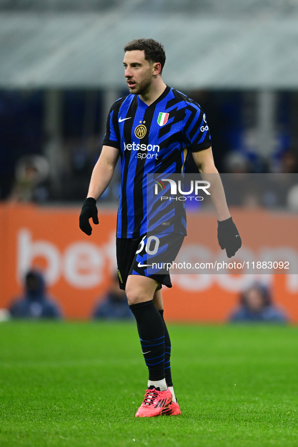 Carlos Augusto of Inter Milan looks on during the Coppa Italia Frecciarossa match between Inter Milan and Udinese Calcio at Giuseppe Meazza...