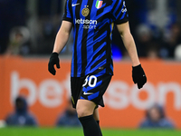 Carlos Augusto of Inter Milan looks on during the Coppa Italia Frecciarossa match between Inter Milan and Udinese Calcio at Giuseppe Meazza...