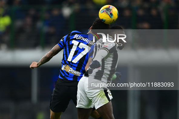 Tajon Buchanan of Inter Milan and Hassane Kamara of Udinese Calcio battle for the ball during the Coppa Italia Frecciarossa match between In...