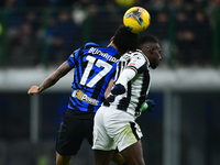 Tajon Buchanan of Inter Milan and Hassane Kamara of Udinese Calcio battle for the ball during the Coppa Italia Frecciarossa match between In...