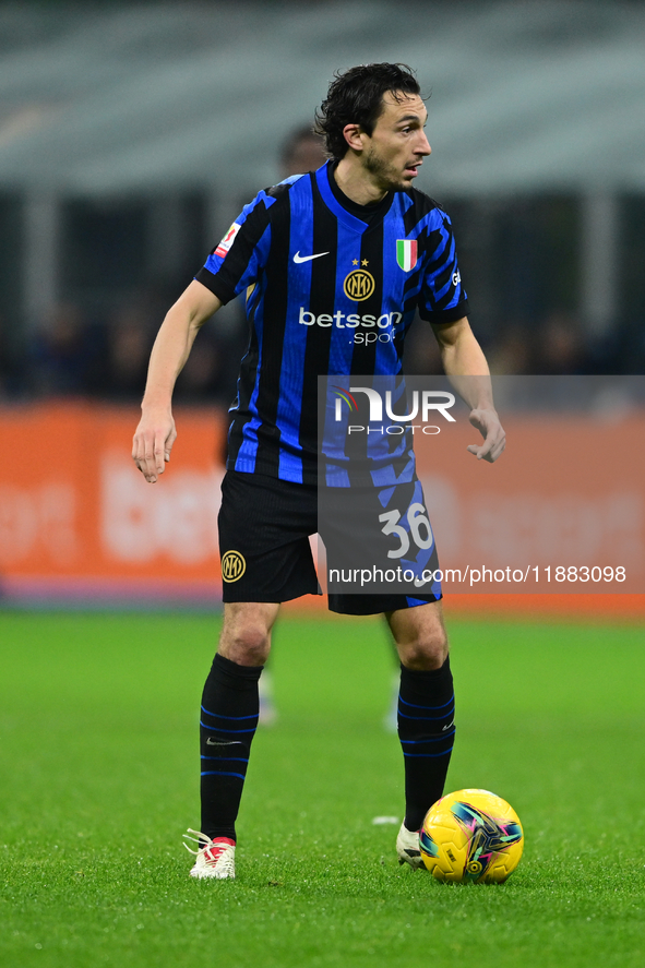 Matteo Darmian of Inter Milan is in action during the Coppa Italia Frecciarossa match between Inter Milan and Udinese Calcio at Giuseppe Mea...