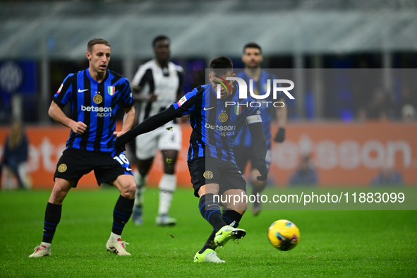 Lautaro Martinez of Inter Milan is in action during the Coppa Italia Frecciarossa match between Inter Milan and Udinese Calcio at Giuseppe M...