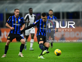 Lautaro Martinez of Inter Milan is in action during the Coppa Italia Frecciarossa match between Inter Milan and Udinese Calcio at Giuseppe M...