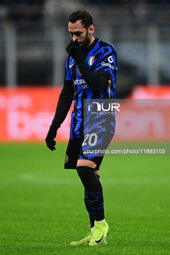 Hakan Calhanoglu of Inter Milan looks on during the Coppa Italia Frecciarossa match between Inter Milan and Udinese Calcio at Giuseppe Meazz...