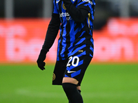 Hakan Calhanoglu of Inter Milan looks on during the Coppa Italia Frecciarossa match between Inter Milan and Udinese Calcio at Giuseppe Meazz...