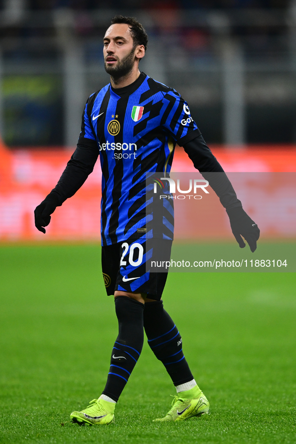 Hakan Calhanoglu of Inter Milan looks on during the Coppa Italia Frecciarossa match between Inter Milan and Udinese Calcio at Giuseppe Meazz...