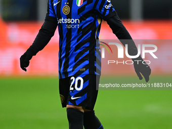 Hakan Calhanoglu of Inter Milan looks on during the Coppa Italia Frecciarossa match between Inter Milan and Udinese Calcio at Giuseppe Meazz...