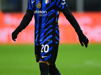 Hakan Calhanoglu of Inter Milan looks on during the Coppa Italia Frecciarossa match between Inter Milan and Udinese Calcio at Giuseppe Meazz...