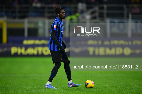 Yann Aurel Bisseck of Inter Milan is in action during the Coppa Italia Frecciarossa match between Inter Milan and Udinese Calcio at Giuseppe...