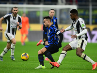 Lautaro Martinez of Inter Milan is in action during the Coppa Italia Frecciarossa match between Inter Milan and Udinese Calcio at Giuseppe M...