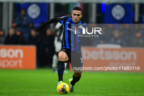 Lautaro Martinez of Inter Milan is in action during the Coppa Italia Frecciarossa match between Inter Milan and Udinese Calcio at Giuseppe M...