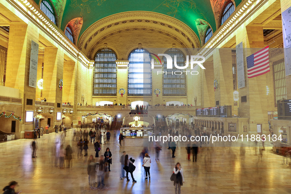 Christmas wreaths hang on the walls of Grand Central Terminal on 42nd Street in New York, N.Y., on December 18, 2024. (