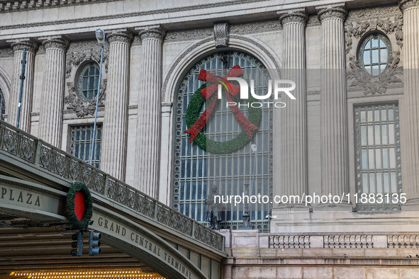 A Christmas wreath hangs outside of Grand Central Terminal on 42nd Street in New York, N.Y., on December 18, 2024. (