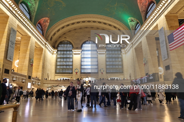 Christmas wreaths hang on the walls of Grand Central Terminal on 42nd Street in New York, N.Y., on December 18, 2024. (