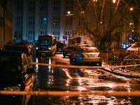 KRAKOW, POLAND - DECEMBER 19:   
Police tape and van at the scene of a shooting on Dietla Street, a key route dividing Krakow's Old Town and...