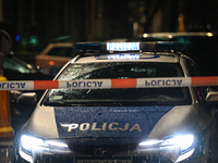 KRAKOW, POLAND - DECEMBER 19:   
Police tape and a police vehicle block Boguslawskiego Street in Krakow’s city center during a security aler...