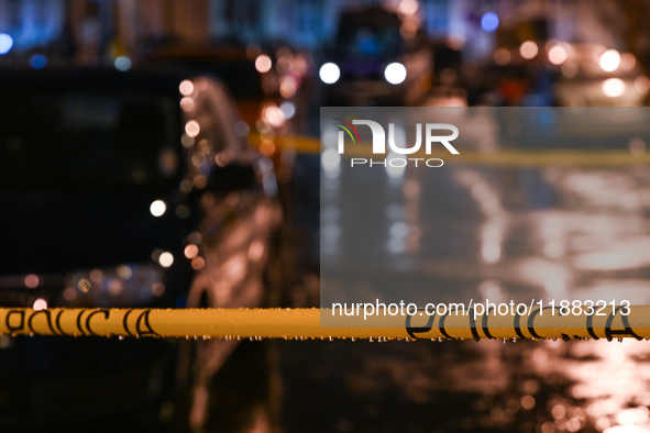 KRAKOW, POLAND - DECEMBER 19:   
Police tape surrounding the scene of a shooting on Dietla Street, a key route dividing Krakow's Old Town an...