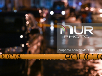 KRAKOW, POLAND - DECEMBER 19:   
Police tape surrounding the scene of a shooting on Dietla Street, a key route dividing Krakow's Old Town an...