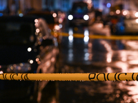 KRAKOW, POLAND - DECEMBER 19:   
Police tape surrounding the scene of a shooting on Dietla Street, a key route dividing Krakow's Old Town an...