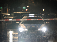 KRAKOW, POLAND - DECEMBER 19:   
Police tape and a police vehicle block Boguslawskiego Street in Krakow’s city center during a security aler...