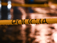 KRAKOW, POLAND - DECEMBER 19:   
Police tape surrounding the scene of a shooting on Dietla Street, a key route dividing Krakow's Old Town an...